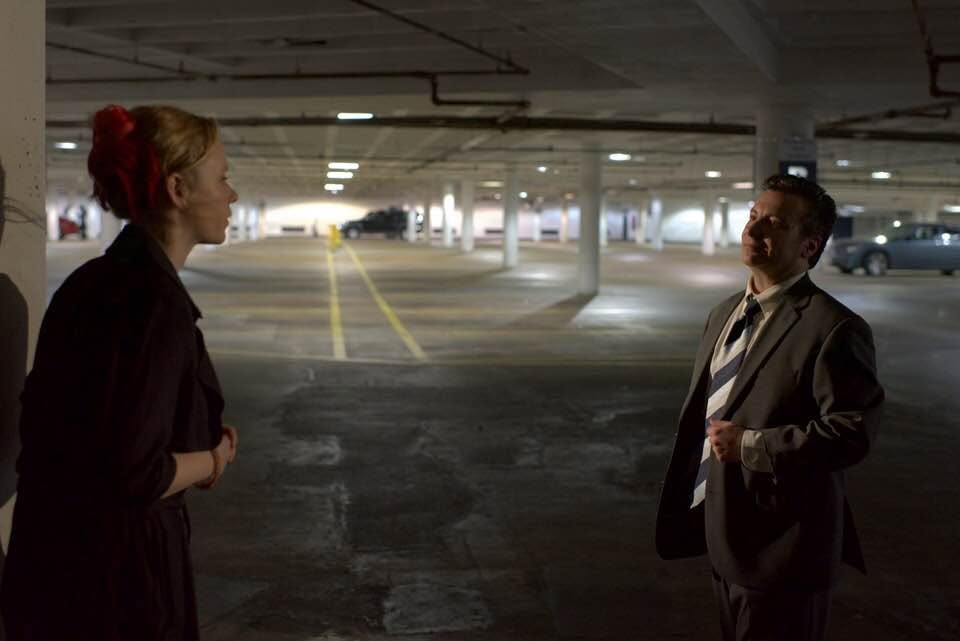 Richard Strauss speaking with a fellow actor on a film set